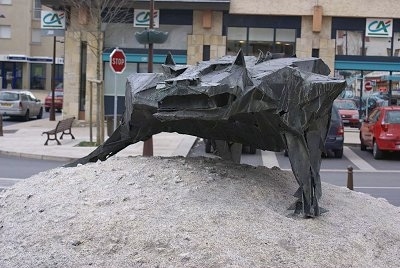 Statue of the Beast on a small square in Marvejols, France