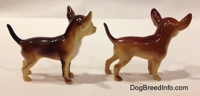 The right side of two different looking ceramic Chihuahua figurines. The figurines are very glossy.