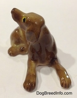 Vintage miniature bone china Vizsla dog. Front view.