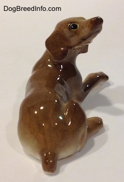 Vintage miniature bone china Vizsla dog. Back view.