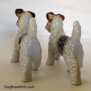 Pair of vintage porcelain Wire Fox Terrier dogs—image