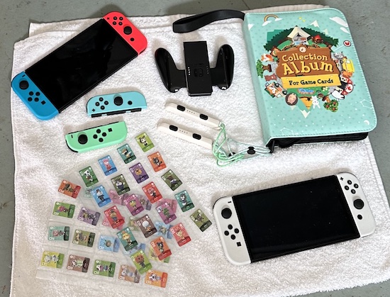 Nintendo Switch accessories laying on a white towel