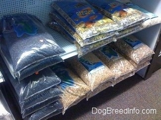 An assortment of gravel on a store shelf