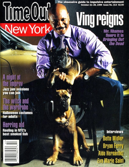 A Time Out New York Magazine cover  from 1999 with a man sitting down holding an Ambullneo Mastiff puppy with another Ambullneo Mastiff puppy sitting in front of him