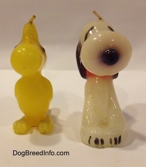 A Snoopy and Woodstock 1970s candle set.