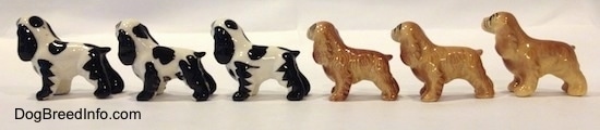The right side of six color variations of a Cocker Spaniel figurine. The figurines are glossy.