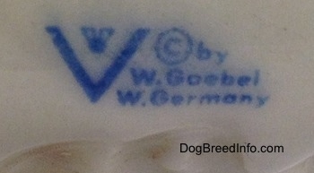 Close up - On the underside of a English Springer Spaniel is the stamp of Goebel W.Germany.