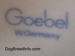 Close up - The underside of a figurine that has a Goebel W.Germany stamp on it.